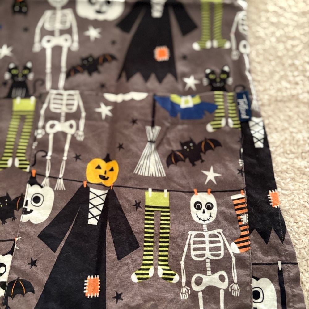 Spooky Halloween Scrub Top with Skeleton and Cat Design